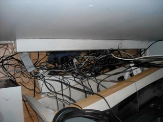Illustration for article titled 10 Of Your Biggest Cable Management Disasters